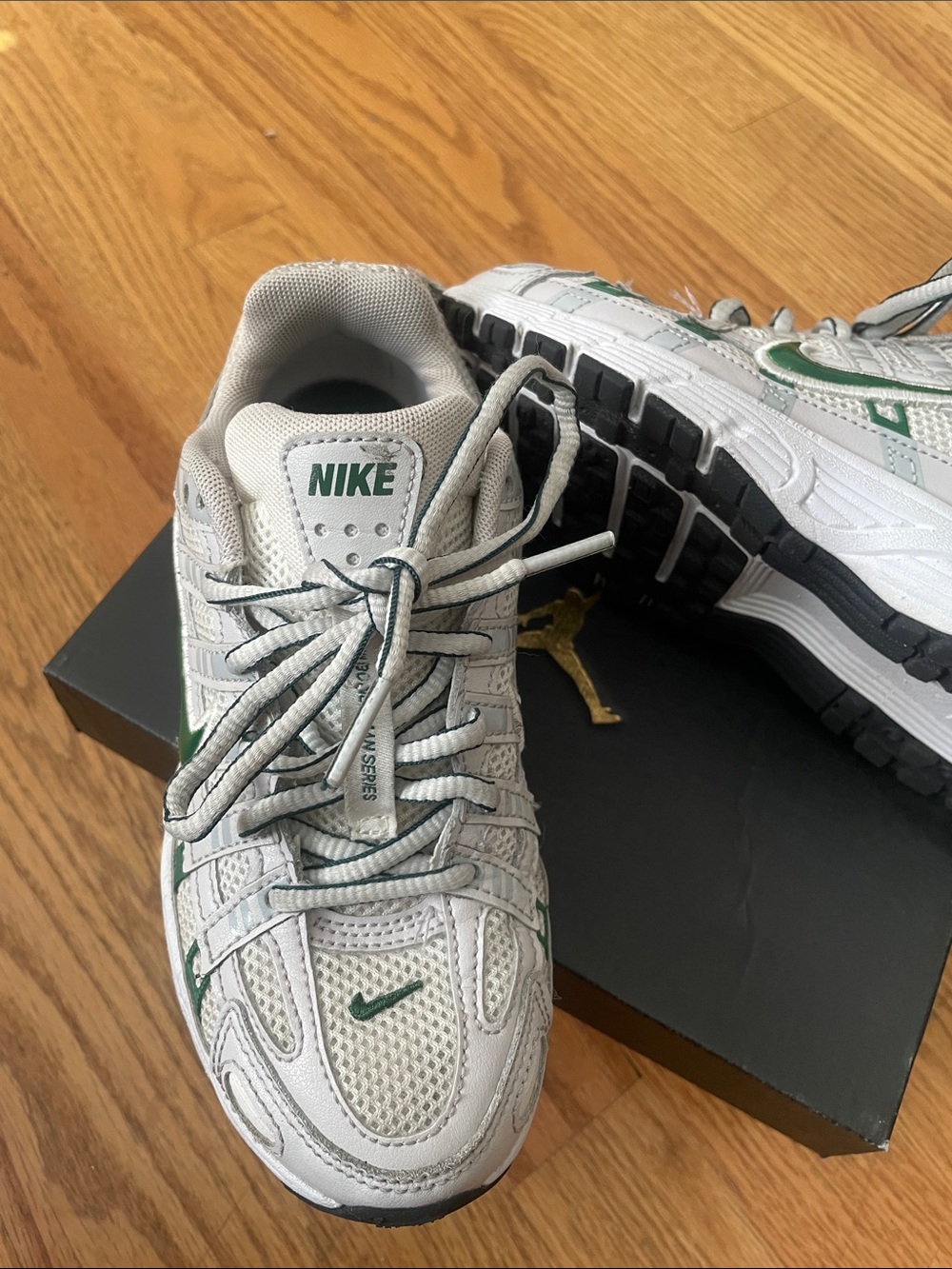 Nike Kids White Sneakers with Green Accents